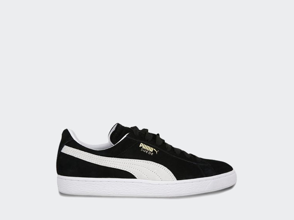 White and store black puma suede